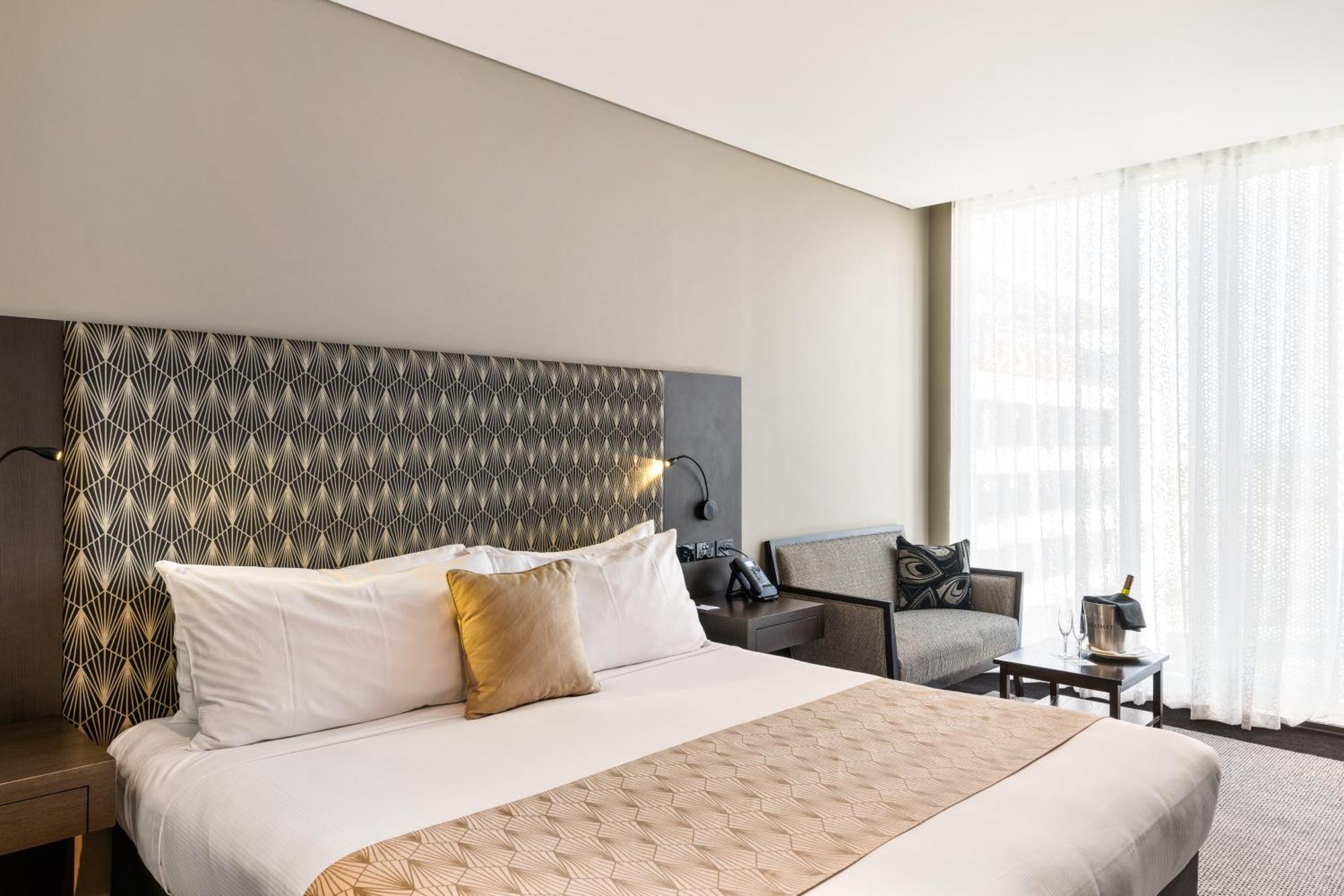 מלון Pullman Brisbane Airport מראה חיצוני תמונה A bedroom at the hotel