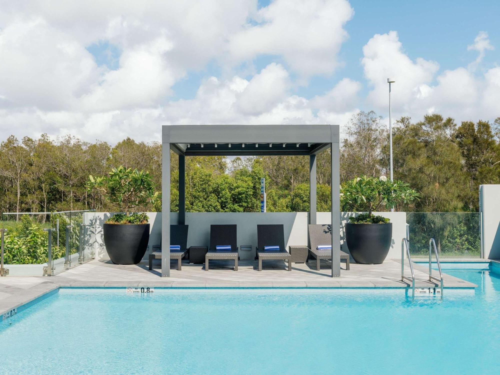 מלון Pullman Brisbane Airport מראה חיצוני תמונה The pool at the hotel